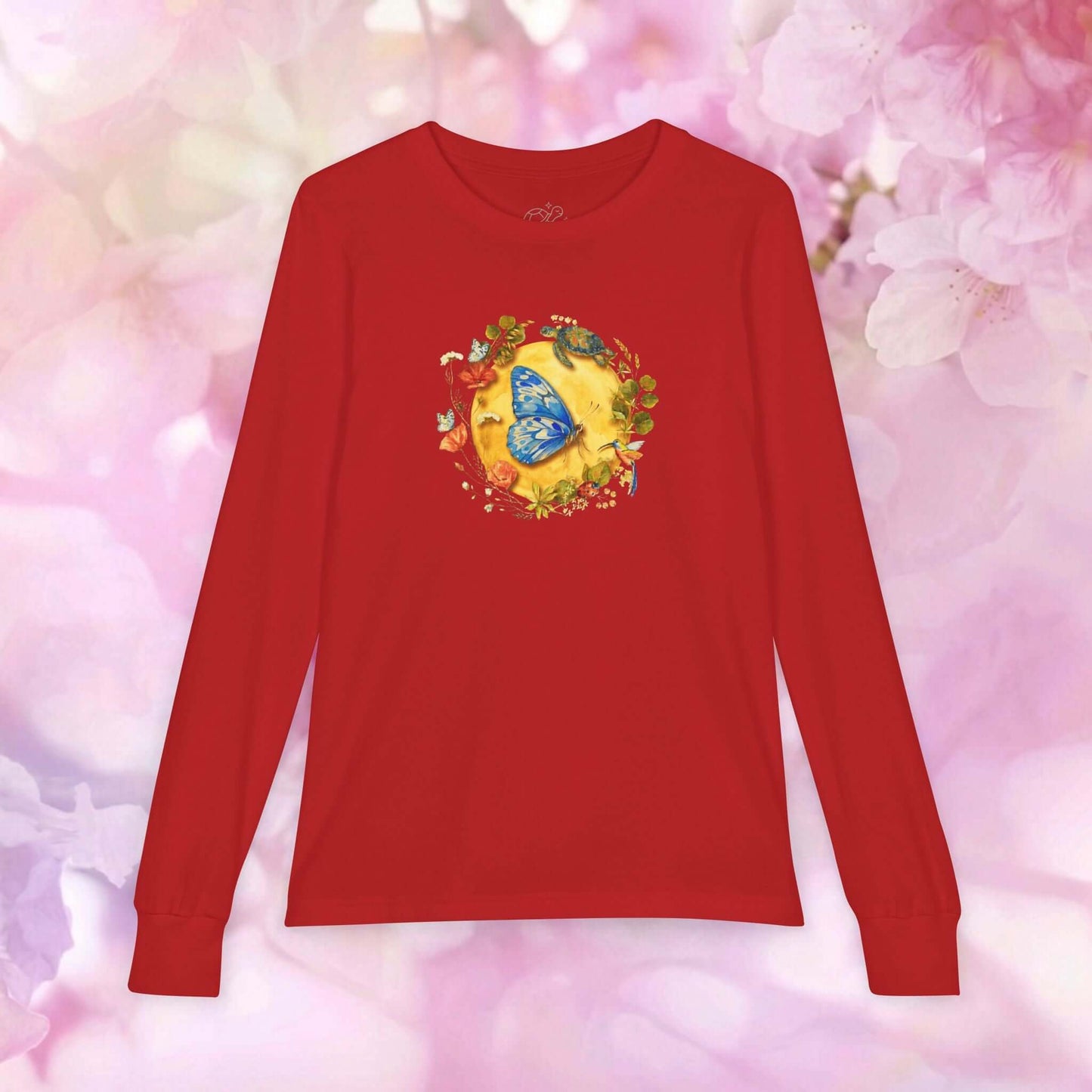 Kids butterfly long sleeve shirt in red with floral design and blue butterfly on a soft background.