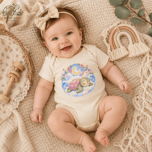 A smiling baby wearing a Starlit Slumber Infant Bodysuit with a turtle design, surrounded by pastel colors and playful decor.