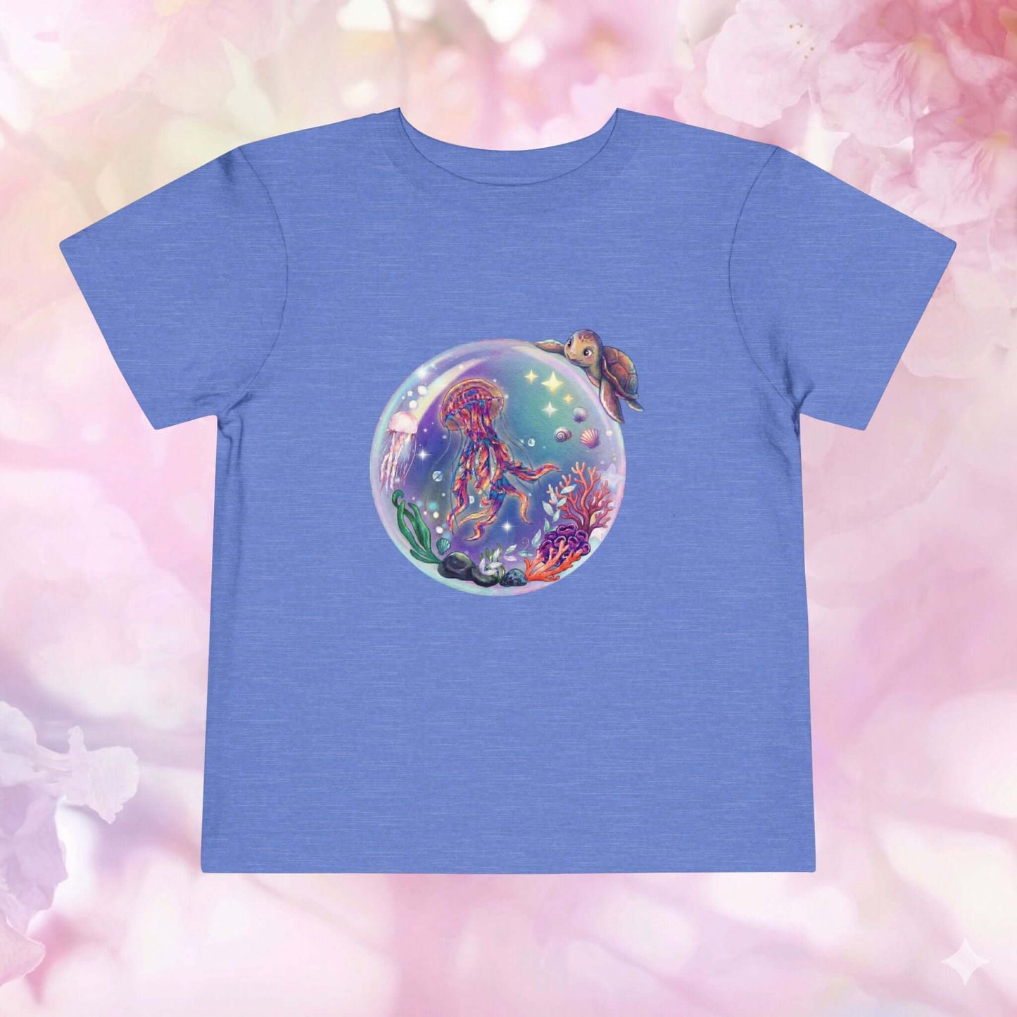 Toddler jellyfish t-shirt featuring a colorful jellyfish and ocean scene inside a magical bubble.