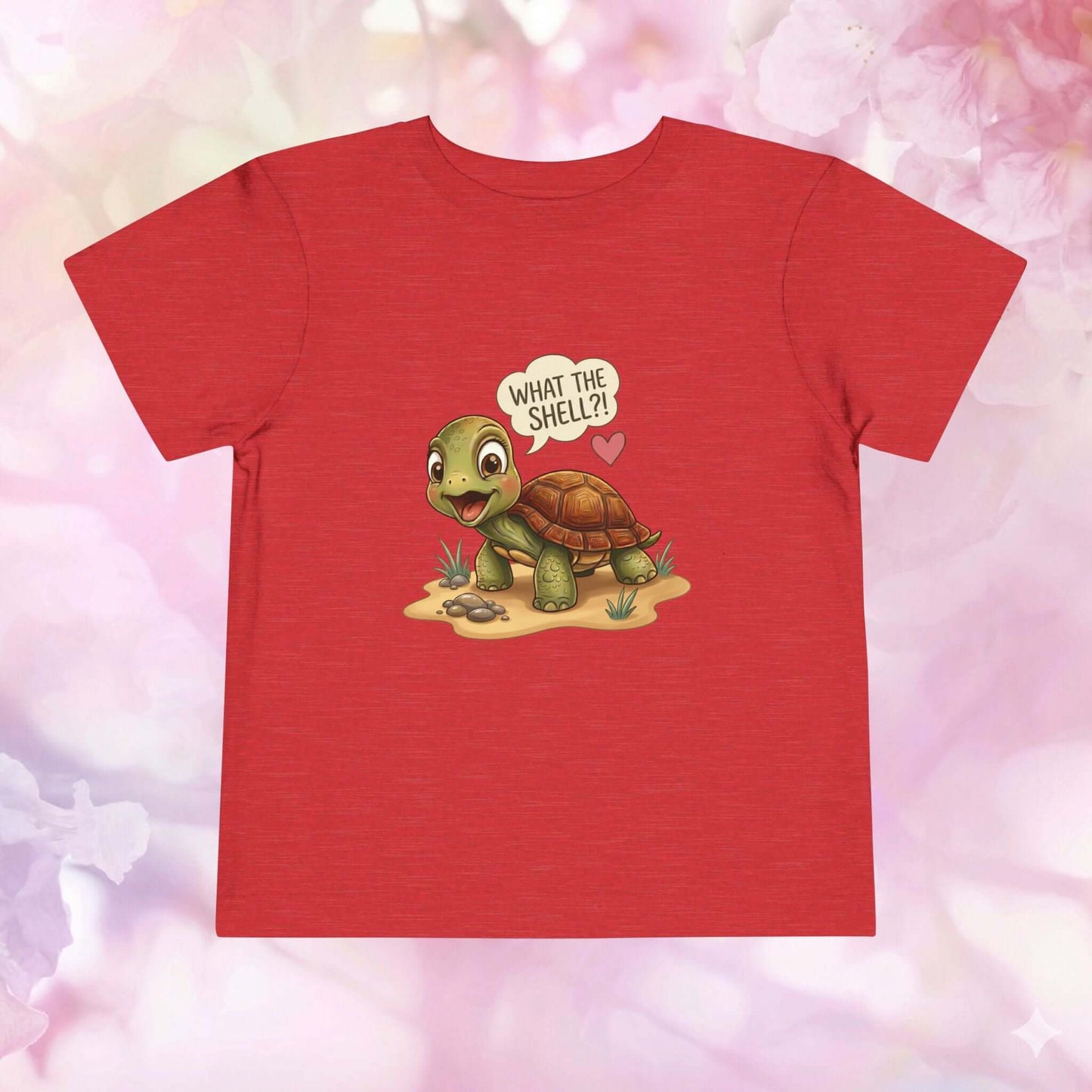 What the Shell?! Toddler Turtle T-Shirt featuring a playful turtle design on a red background.