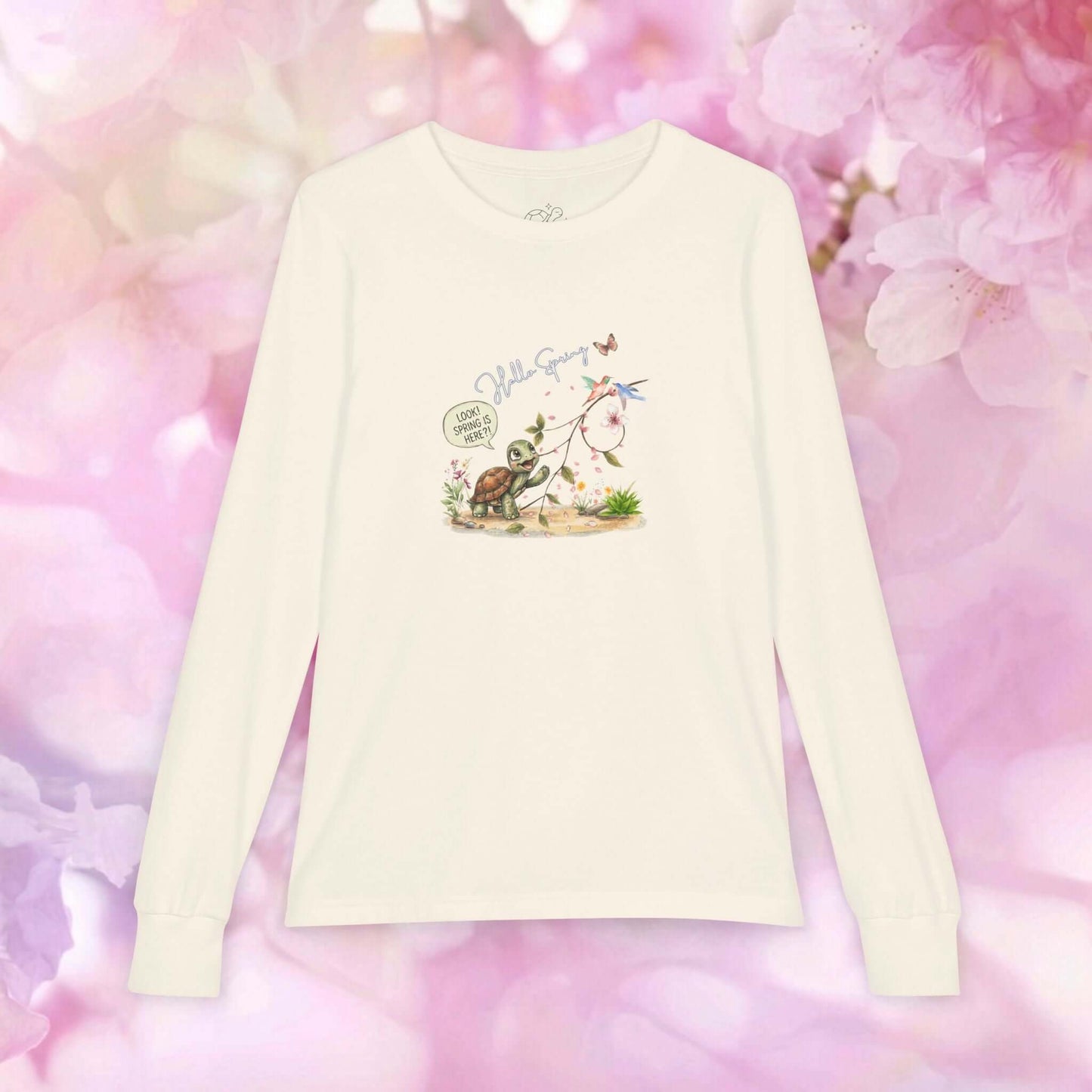 Hello Spring kids long sleeve shirt featuring a cute turtle adventurer in a floral background.