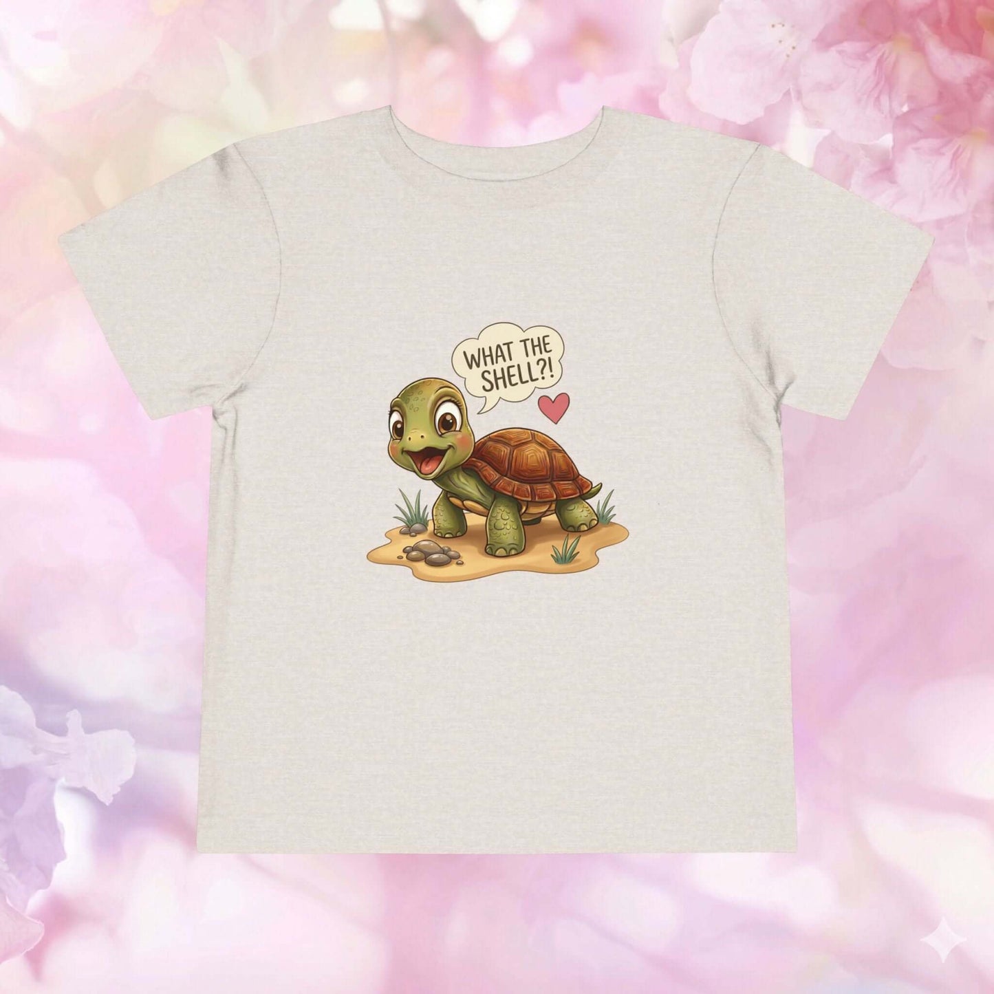 What the Shell?! Toddler Turtle T-Shirt featuring a cute turtle design on a light background.