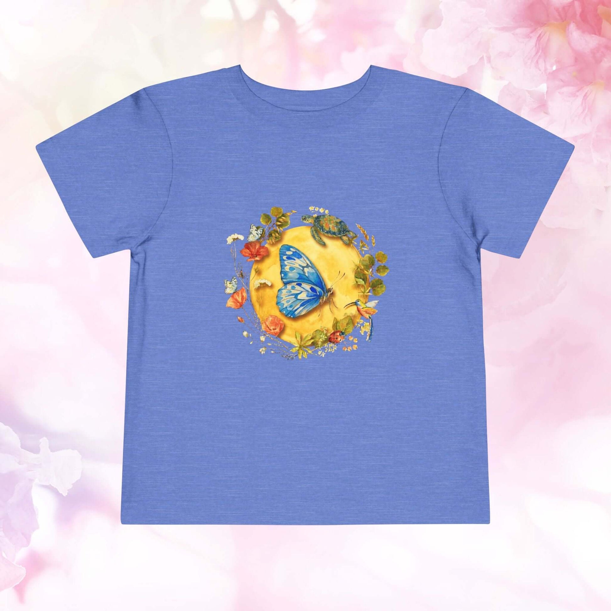 Radiant Blue Butterfly Toddler T-Shirt featuring a blue butterfly on a golden sun, perfect for little adventurers.