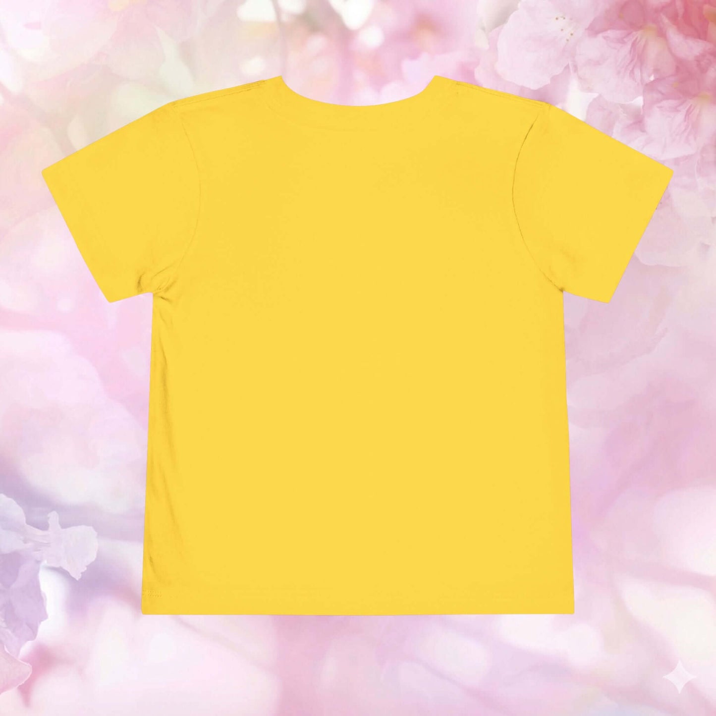 Back view of the vibrant yellow What the Shell?! Toddler Turtle T-Shirt for playful adventures.