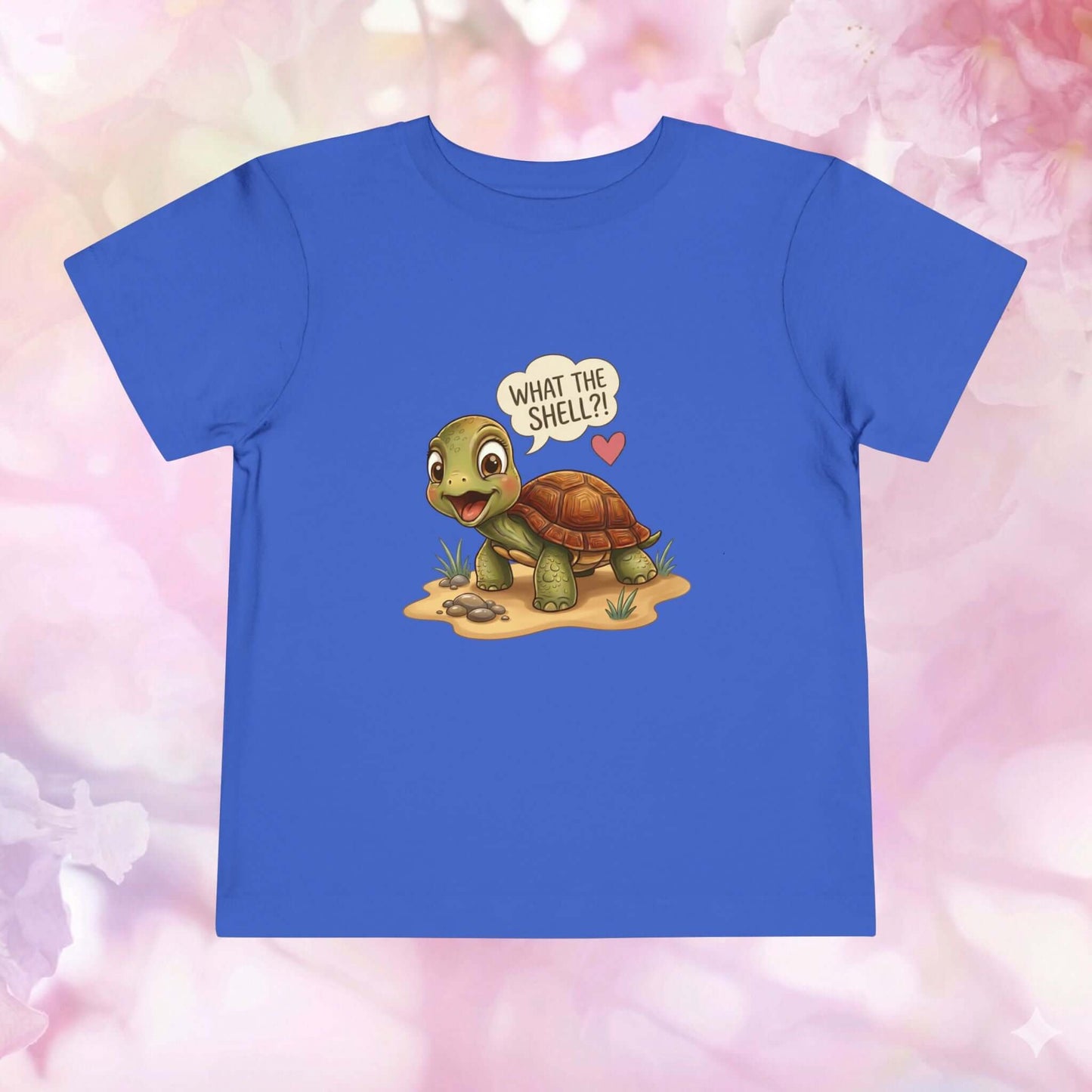 What the Shell?! Toddler Turtle T-Shirt featuring an adorable turtle character on a blue shirt.