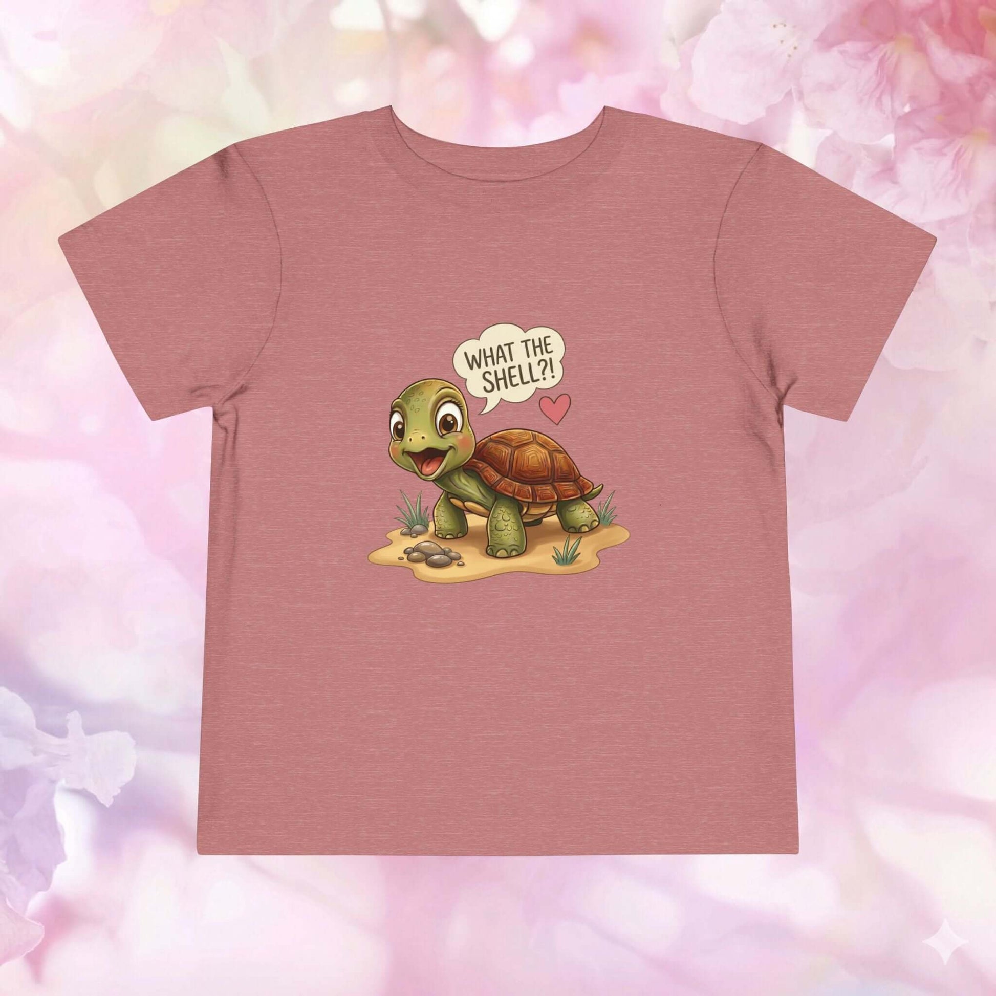 Cute toddler turtle t-shirt with playful design featuring a turtle and the text 'What the Shell?!'