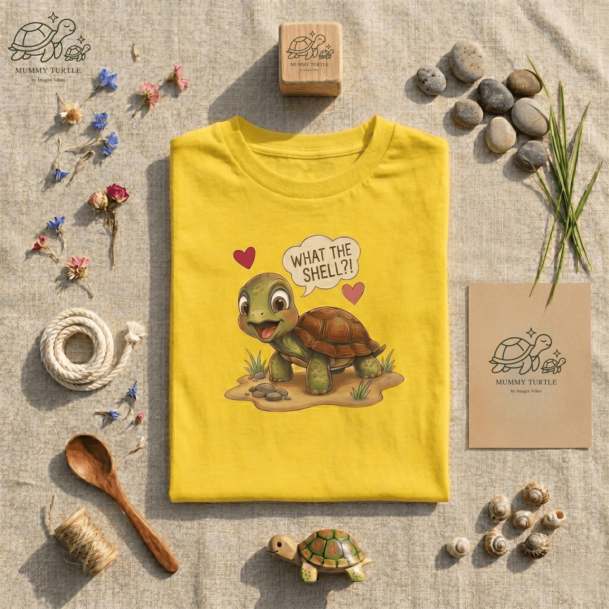 What the Shell?! Toddler Turtle T-Shirt featuring a playful turtle design on a yellow background with rocks and flowers.