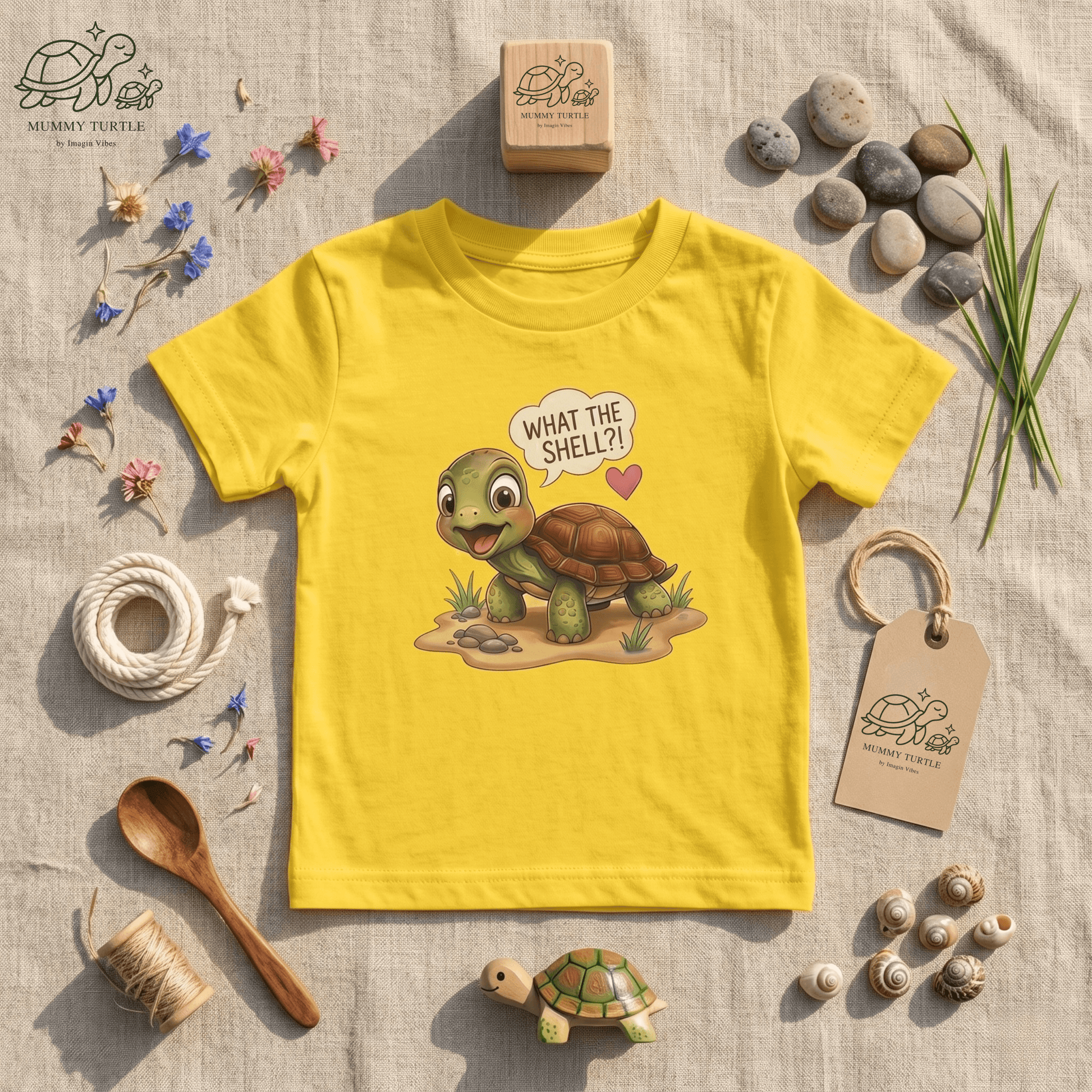 What the Shell?! Toddler Turtle T-Shirt with a playful turtle design on a bright yellow shirt.