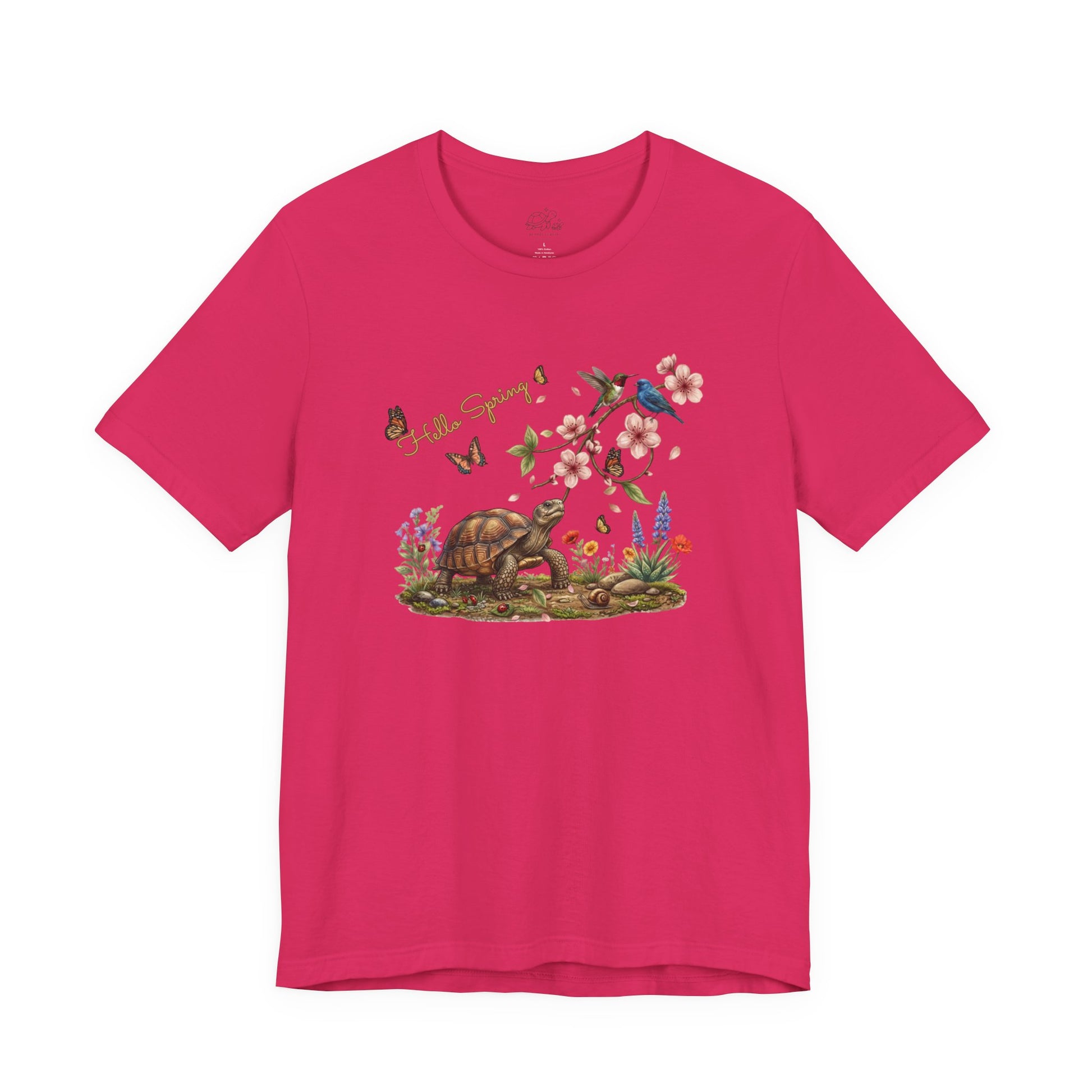 Hello Spring jersey tee featuring a turtle, pink blossoms, and colorful birds in a vibrant design.