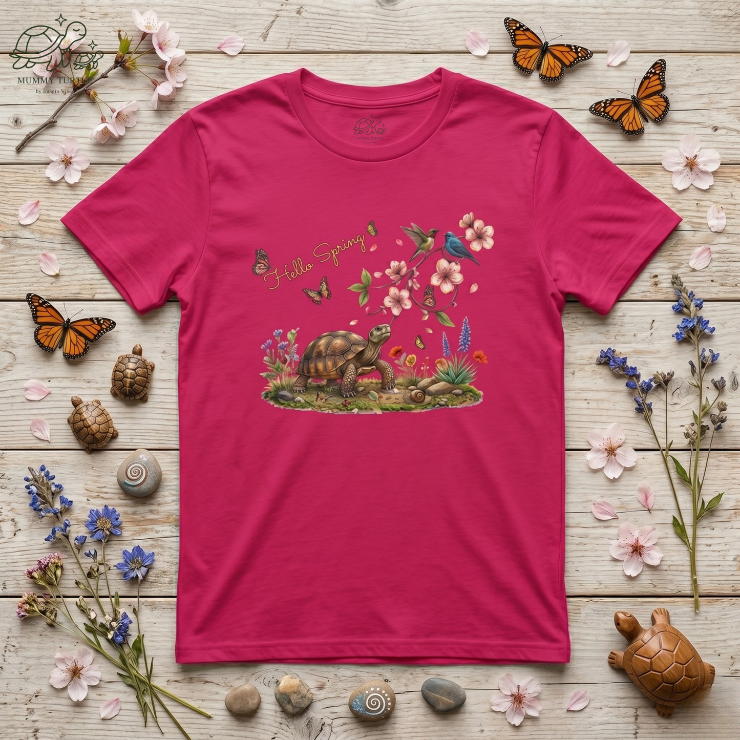 Hello Spring unisex jersey tee featuring a turtle, cherry blossoms, and butterflies on a pink background.