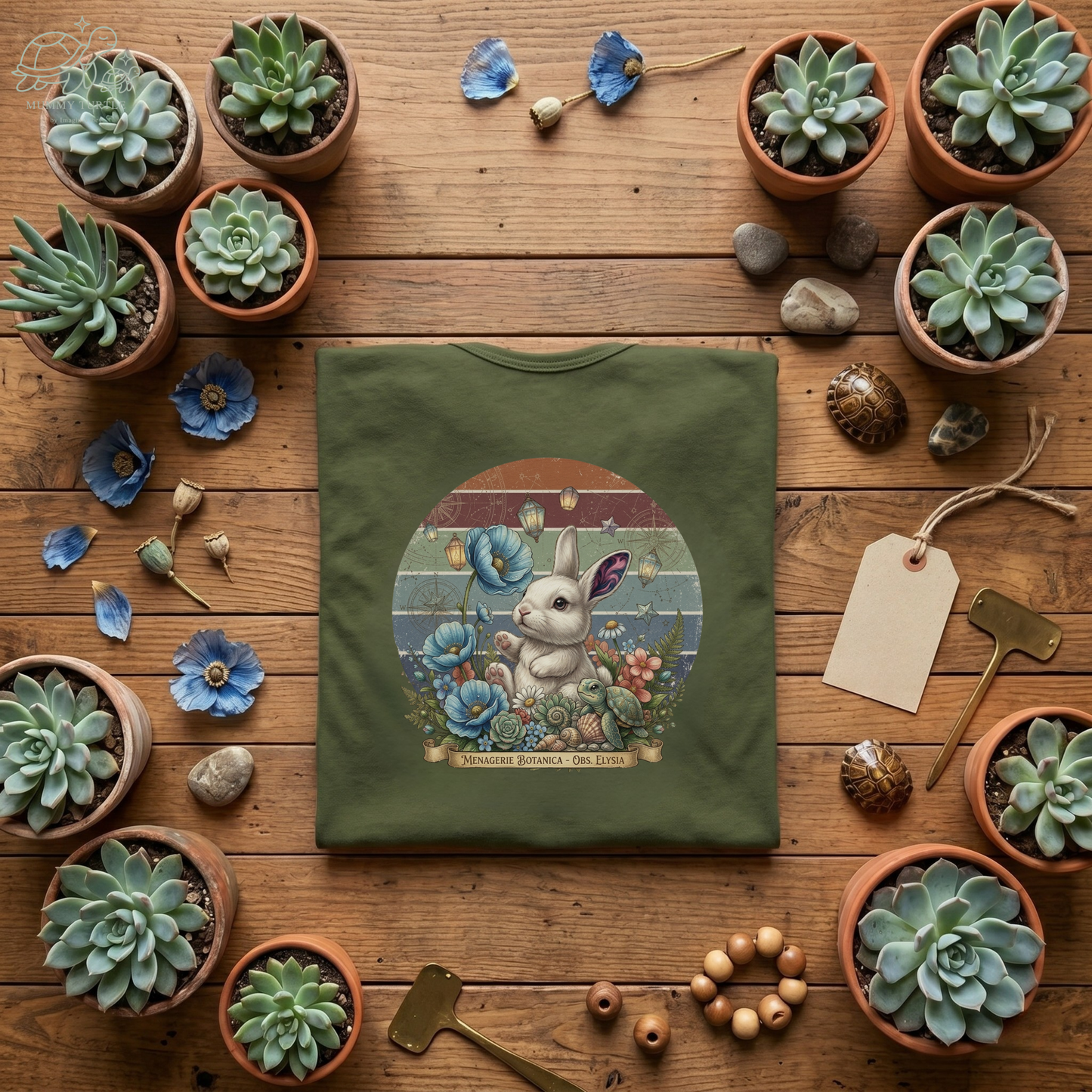 Vintage botanical racerback tank featuring a cute bunny among blue flowers, styled with succulents and rustic decor.