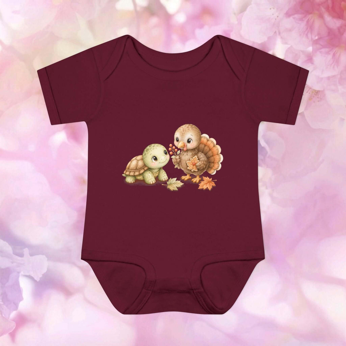 Burgundy Harvest Friends Infant Bodysuit featuring a sweet turtle and turkey sharing autumn treasures for baby Thanksgiving.