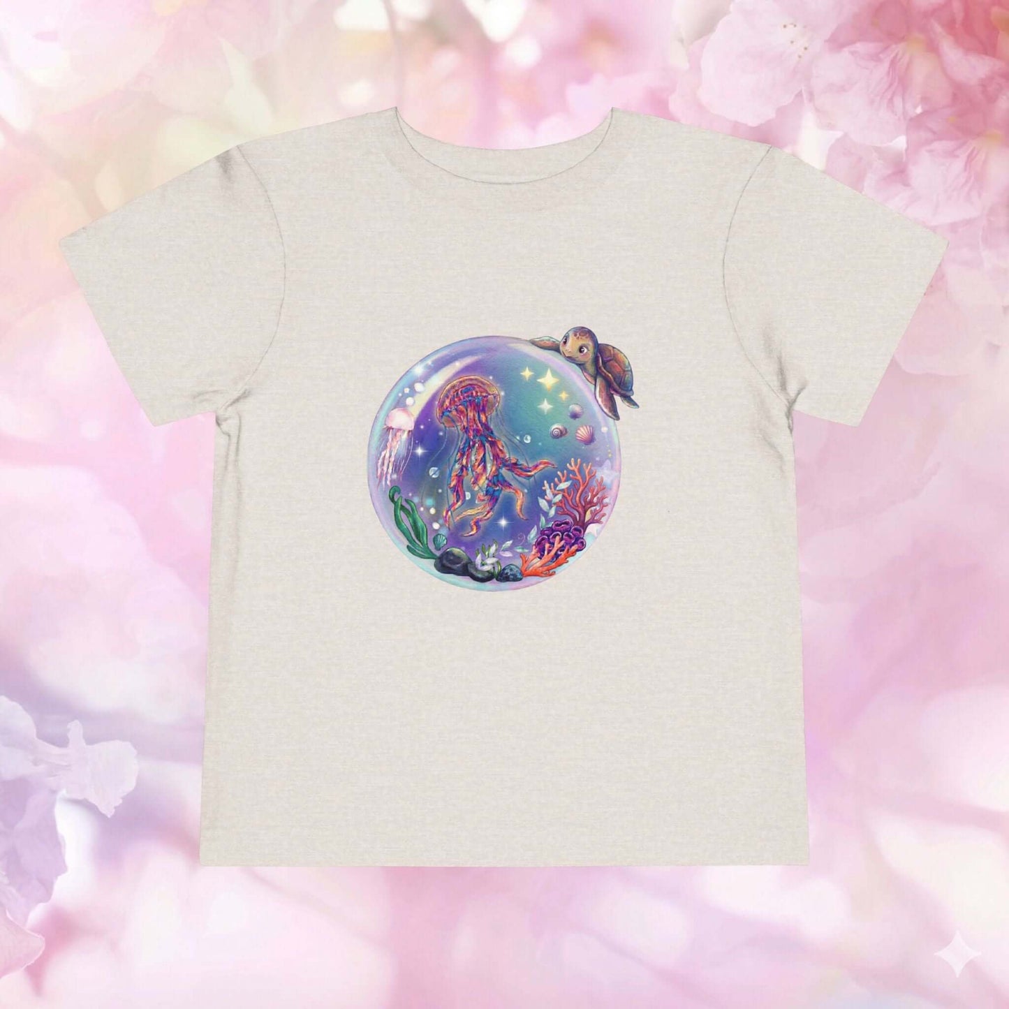 Toddler jellyfish t-shirt featuring a magical underwater bubble with a jellyfish and colorful coral.