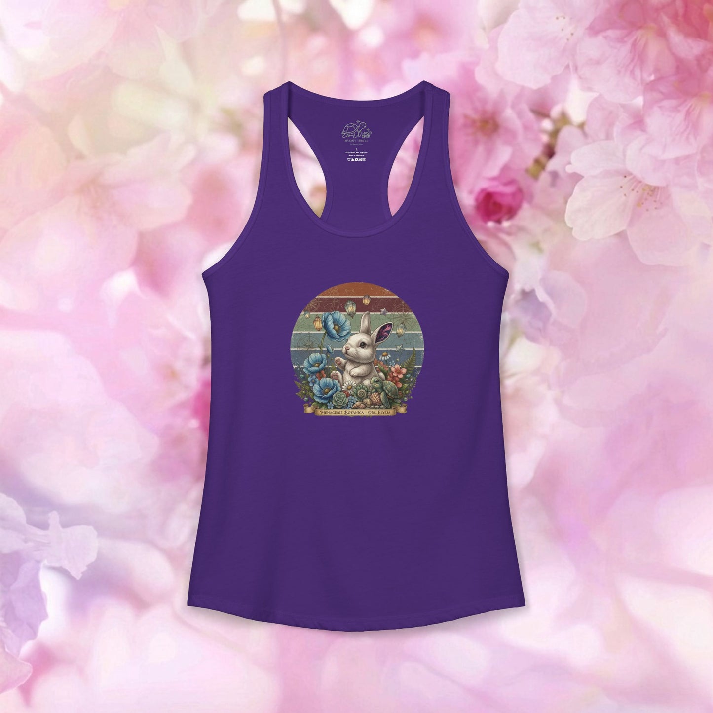 Vintage botanical racerback tank featuring a white bunny surrounded by flowers on a purple tank top.