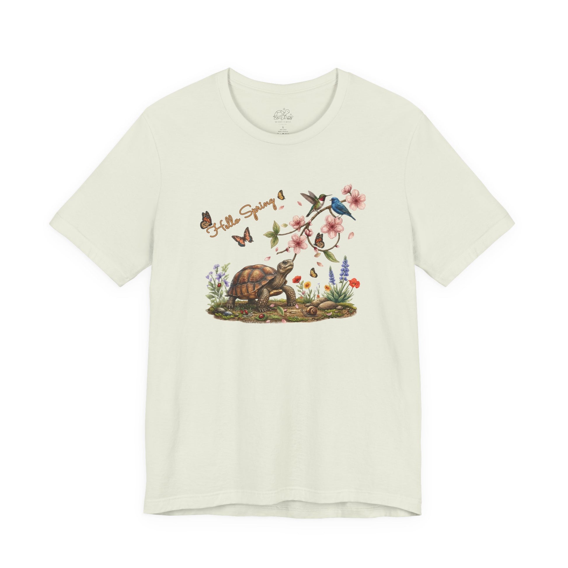 Hello Spring Unisex Jersey Tee featuring a turtle among cherry blossoms and birds, celebrating spring's beauty.