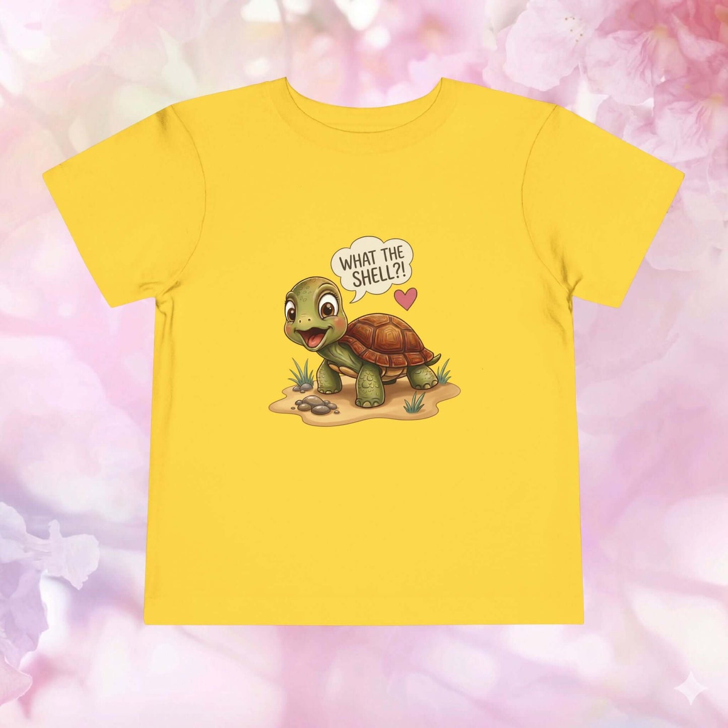 What the Shell?! Toddler Turtle T-Shirt featuring a cute turtle on a yellow background with playful designs.