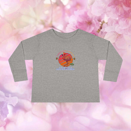 Toddler flamingo long sleeve shirt featuring a colorful graphic design on a grey background with a floral backdrop.